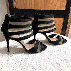 Black, back zip heels.  3” heels